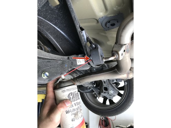 This step and the next are meant to show you how to remove a rubber hanger - Parts are not being removed from the vehicle at this time