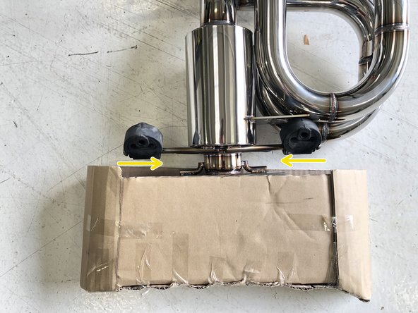 Locate the rearward hanger rod on the 27WON Muffler Section