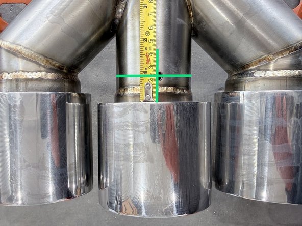 Place muffler on a sturdy surface as you will be drilling (up to) three holes for installation of the silencer