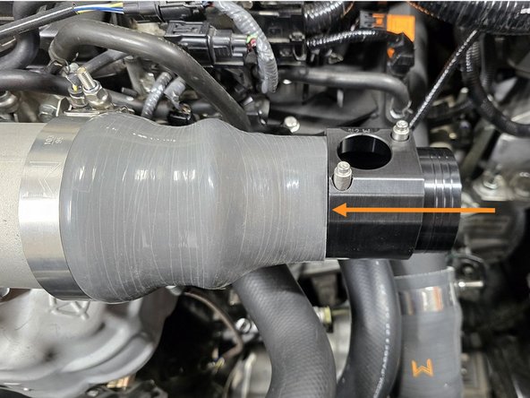 Install MAF housing into the previously mounted TIP silicone in the orientation shown