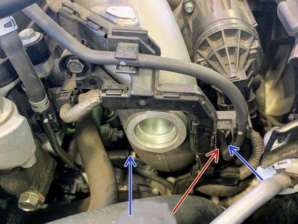 The (2) 10mm bolts are shown off the car to better demonstrate their location