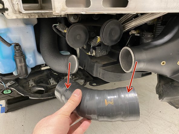 Remove the hot side IC inlet silicone without disturbing pipe on the left side