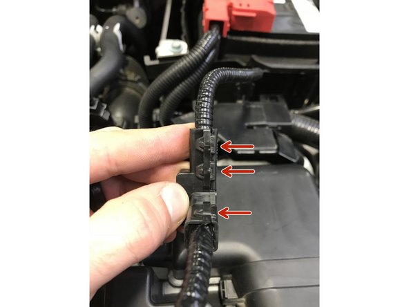 The MAF wire cover consist of two halves that are held together by push lock clips.  These will need to be unlocked to remove the cover