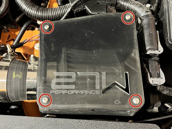 Reinstall the airbox lid and secure it with the 4x screws removed earlier. Torque the 4x screws to snug