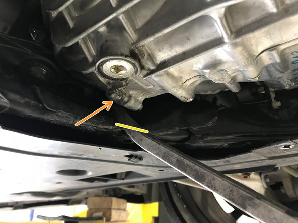 To remove/install the RMM, the transmission must be rotated forward with pry bar to provide extra clearance