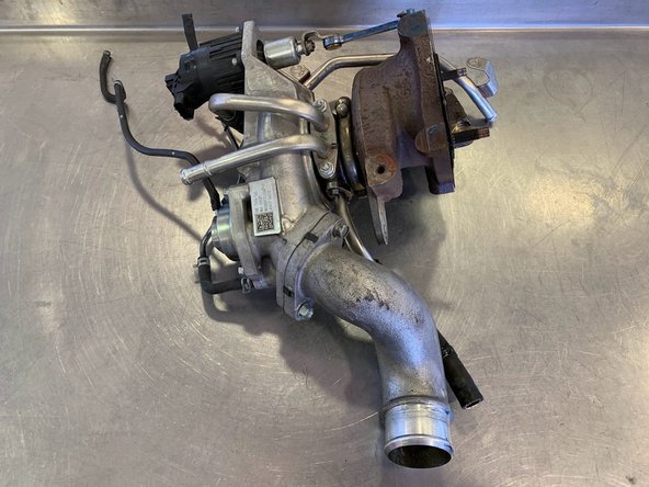 Remove the turbo assembly from the car and place on a workbench