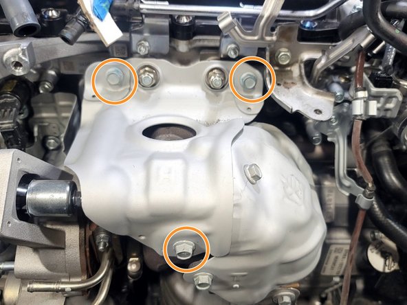 Remove three (3) bolts with 12mm socket and ratchet