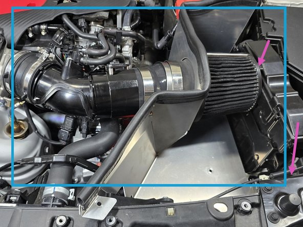 Holding the EVAP elbow in one hand, and the intake in the other, gently press the elbow into the TIP coupler while pressing the MAF housing over the EVAP elbow