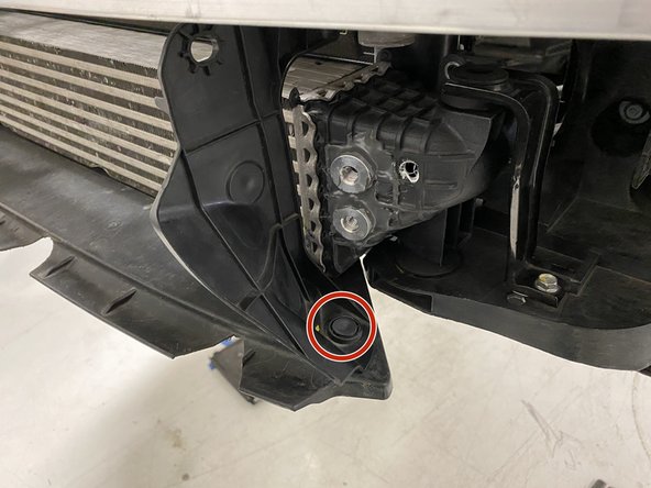 Use a flathead screwdriver to remove the two (2) push clips