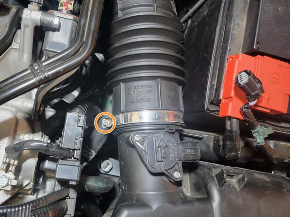 Using a 5.5mm socket and a 3/8&quot; ratchet loosen the clamps on the airbox lid, and the throttle body