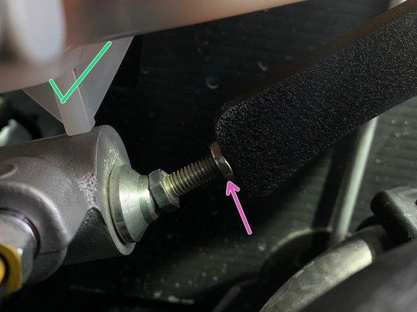 The brake brace foot can now be moved in or out by turning bottom nut, shown by the blue arrow, with a 10mm open end wrench