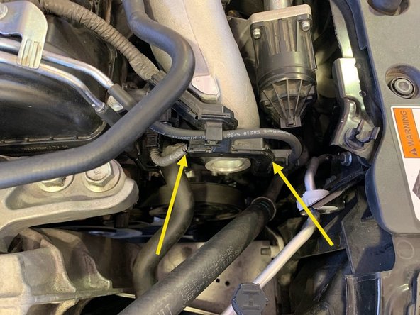 Reinstall the two OE 12mm bolts with a 12mm socket and a 3" extension