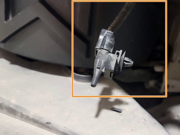 Pull ambient temperature sensor over end tank as shown