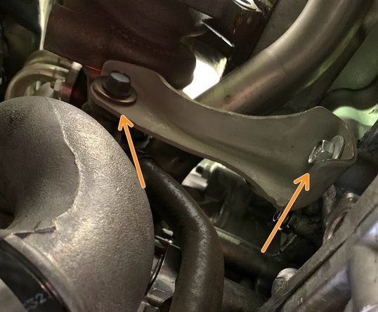 Undo 14mm bolts holding support bracket in place