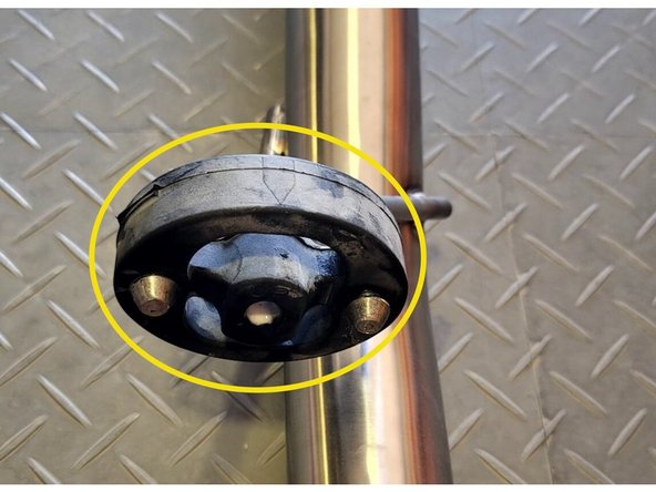 Use tongue &amp; groove pliers to press the rod out of the rubber hanger, remove the rubber support off the OE exhaust hangers