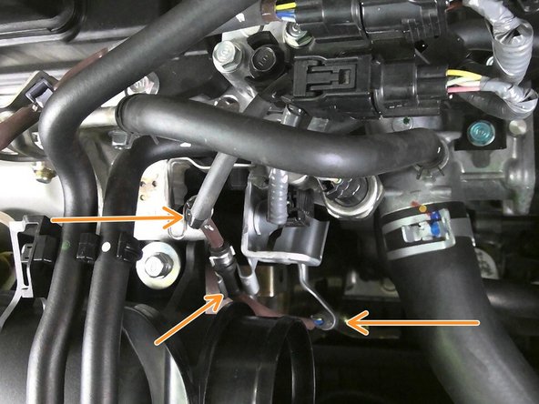 Remove the three (3) locating tabs for the secondary O2 sensor wire