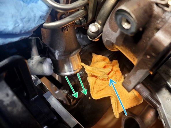 Slide inlet hose off turbocharger compressor cover