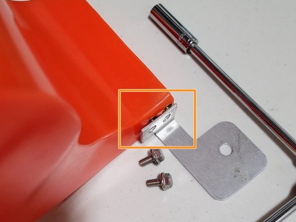 Attach provided right bracket to Snorkel as shown using provided M6 hardware. Let bracket wiggle a bit