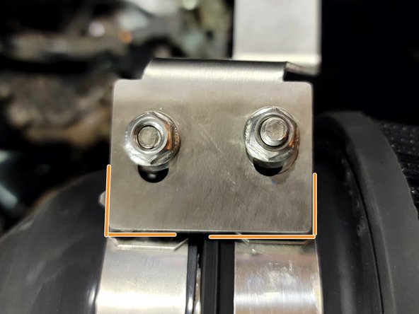 Square up bracket at clamp end and secure nuts