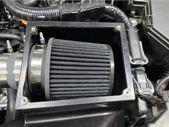 Remove the airbox gasket as shown