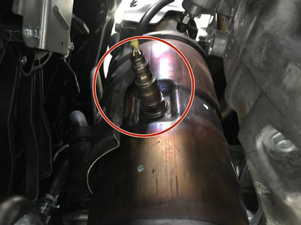 Locate the secondary O2 sensor on the downpipe
