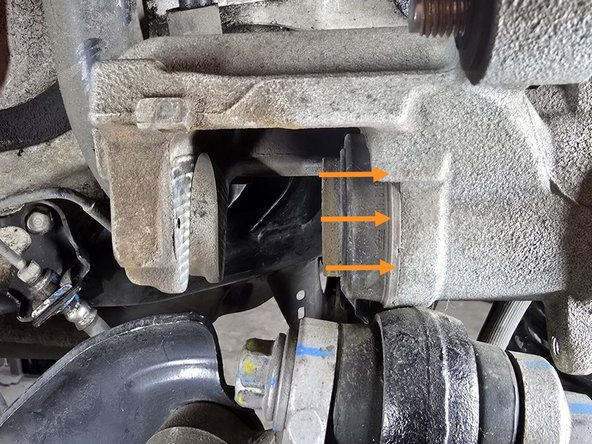 With the spindle turned clockwise you can safely compress the rear caliper piston using a compressor tool or C-clamp