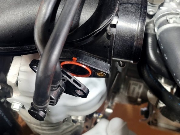 Reinstall two (2) screws into Turbo Inlet Pipe (TIP) with T30 Torx Bit to secure EVAP valve