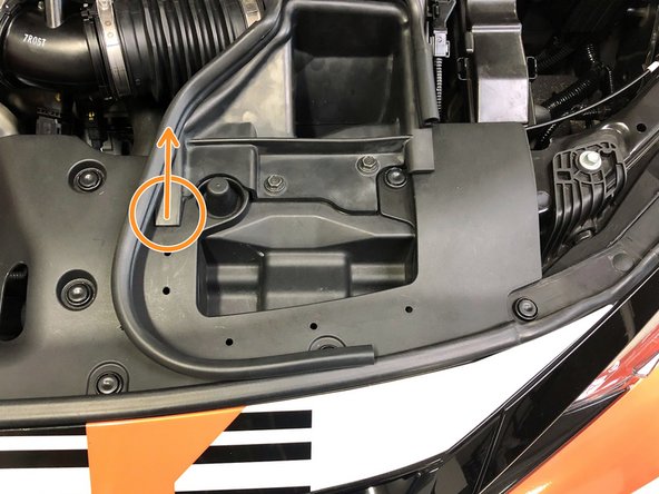 There are five push clips, roughly marked with red circles in the image, that are removed by pulling upwards on the weatherstripping