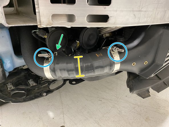 Place a provided 67-75mm T-Bolt clamp onto the hot side IC inlet silicone as shown