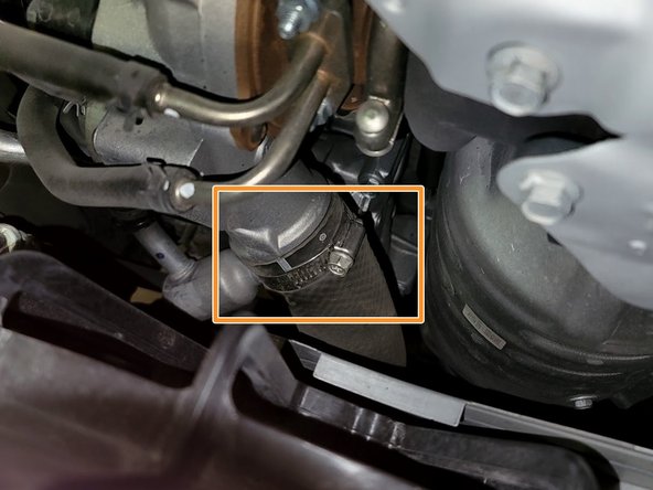 Use 10mm wrench or short 10mm socket and 1/4&quot; ratchet to loosen clamp at turbo  outlet