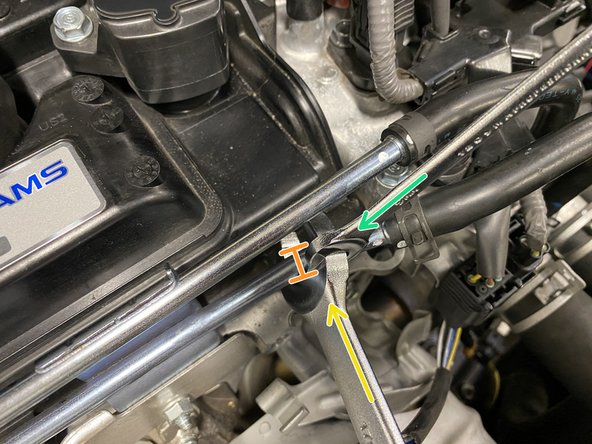 The lower metal coolant pipe needs to be bent down a small amount to provide clearance for the EVAP Valve