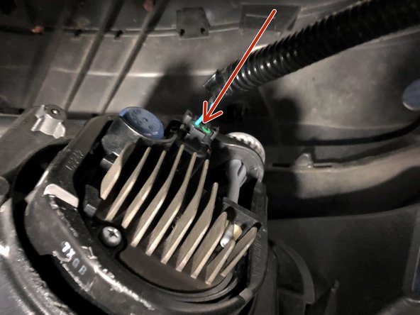 Lift the bumper close to the front of the vehicle