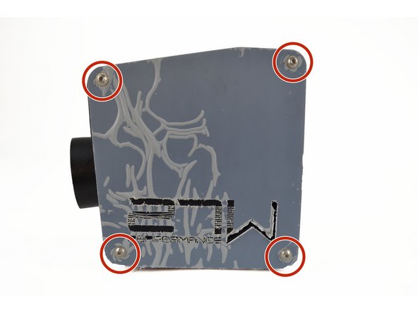 Use a 3mm Allen Key to remove the four flanged button head bolts holding the lid on