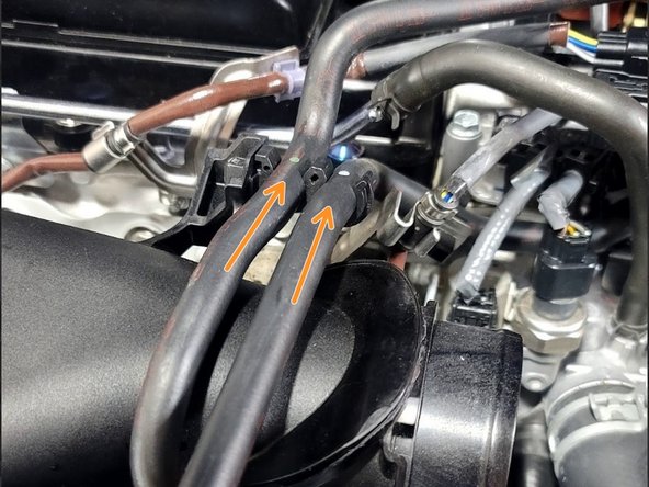 Route rubber hoses as shown and insert them into the clips