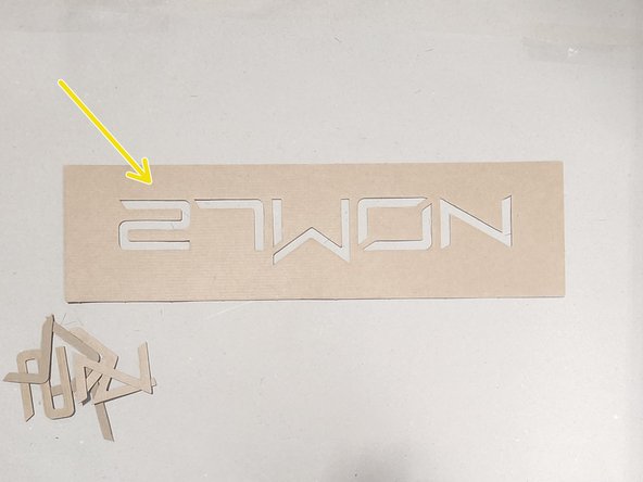 Carefully &quot;pop&quot; out the die-cut letters of the stencil