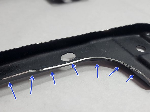 The bumper support bracket removed in Step 17 needs to be trimmed a bit