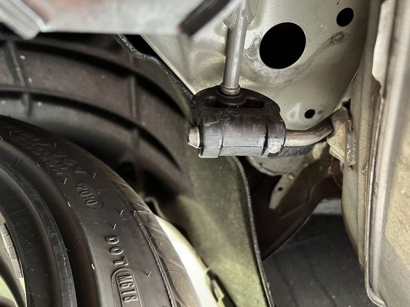 Reconnect the rubber hanger to the exhaust hanger