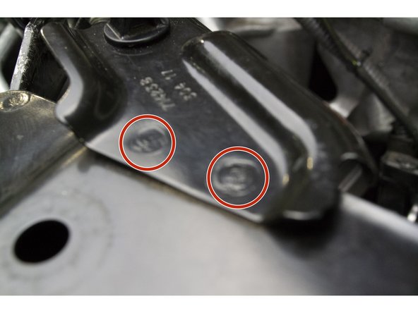 Use a 1/4&quot; drill bit to drill out the 2 tac welds circled in red