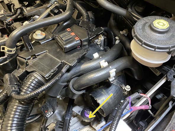 Slide the rubber hose off the throttle boddy