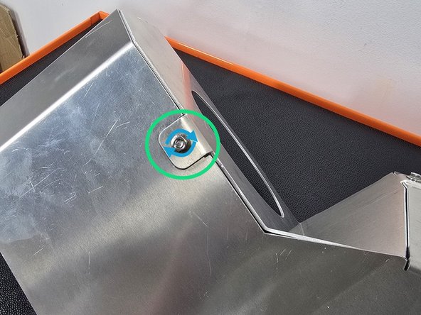 Thread a proved M5 nut onto the bottom side of the bolt as shown