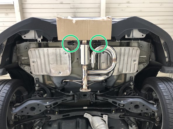 Verify the bead of the hanger is through the rubber hanger as shown