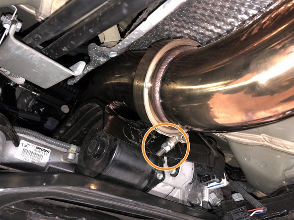 Next tighten the front-pipe to forward mid-section v-band clamp using a 10mm socket and ratchet. Torque to 8-12 lb-ft