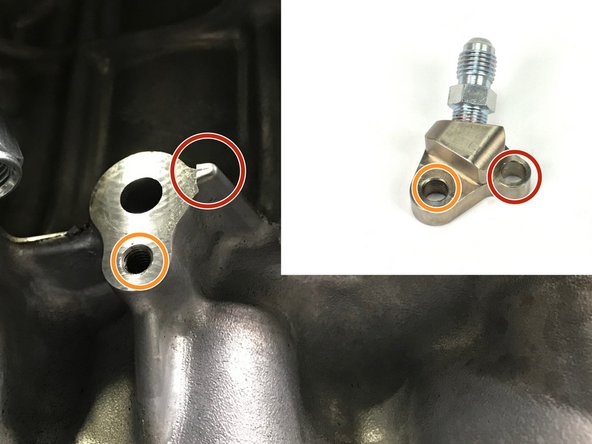 The small protrusion on the engine is critical and must align with the hole on the side of the oil feed block fitting circled in red