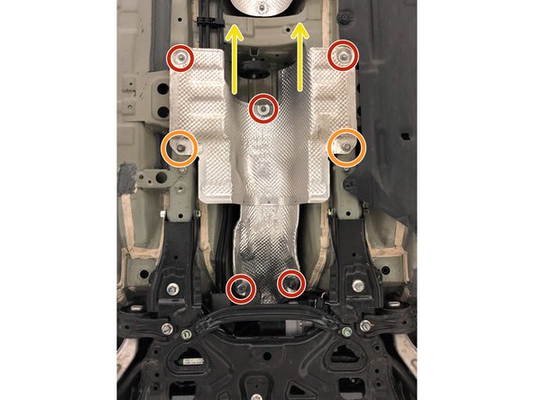 Two of the 10mm bolts are slightly obstructed by the front-pipe as shown