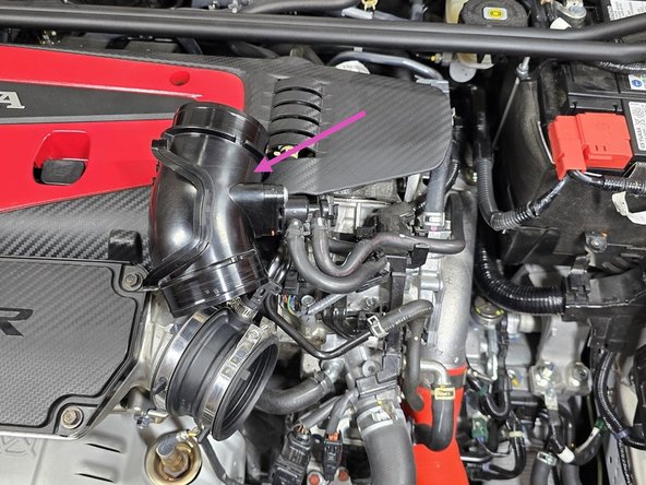 The rubber grommet itself can be left on the mounting stud in the engine bay, or stored with your OE airbox as it will not be used in this install