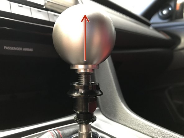 Unthread the OEM shift knob