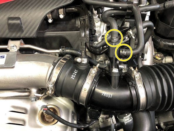 Use needle nose pliers to clamp the OEM spring clamps for the EVAP silicon Boost feed and EVAP dump hoses