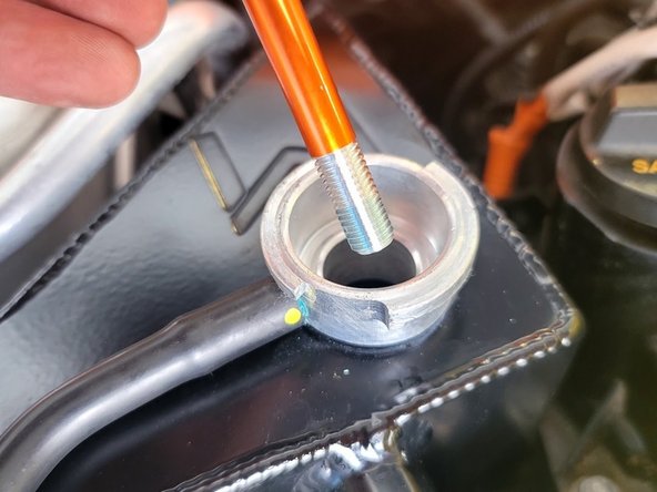 The 27WON coolant tank does not include a sight glass by design. These discolor and can be prone to leaking. Coolant level must be checked using the dip stick periodically. 27WON recommends checking coolant level during oil changes