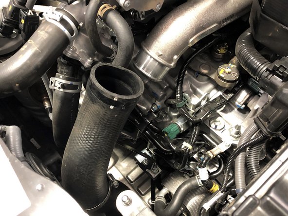 Slide this clamp down the OEM boost tube
