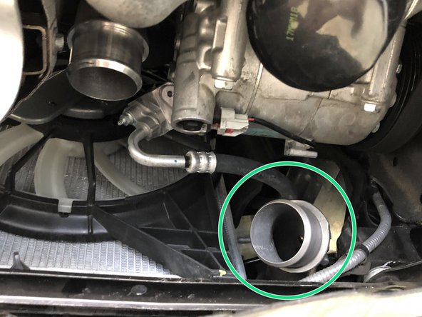 Slide this clamp toward the center of the OEM boost tube and out of the way